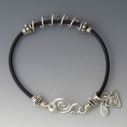 Silver and leather bracelet